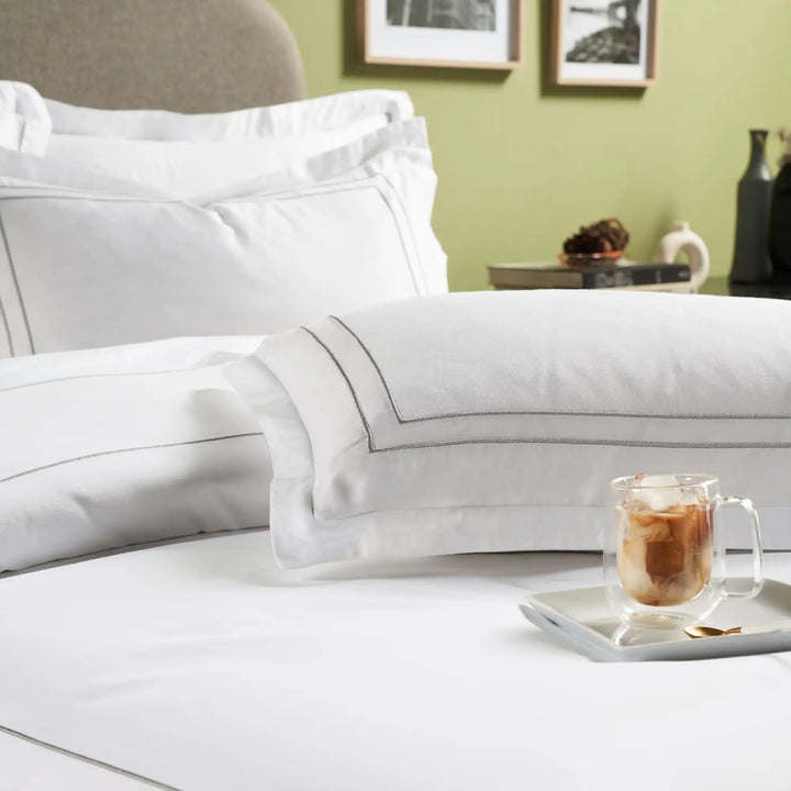 INDULGE - 550 TC PILLOW COVERS WITH MERROW DOUBLE LINE EMBROIDERY